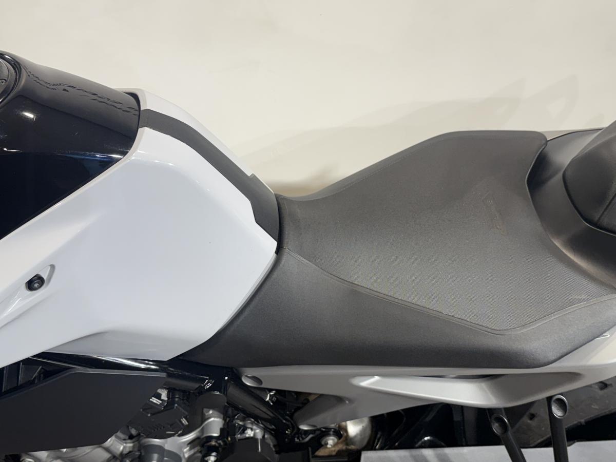 9957