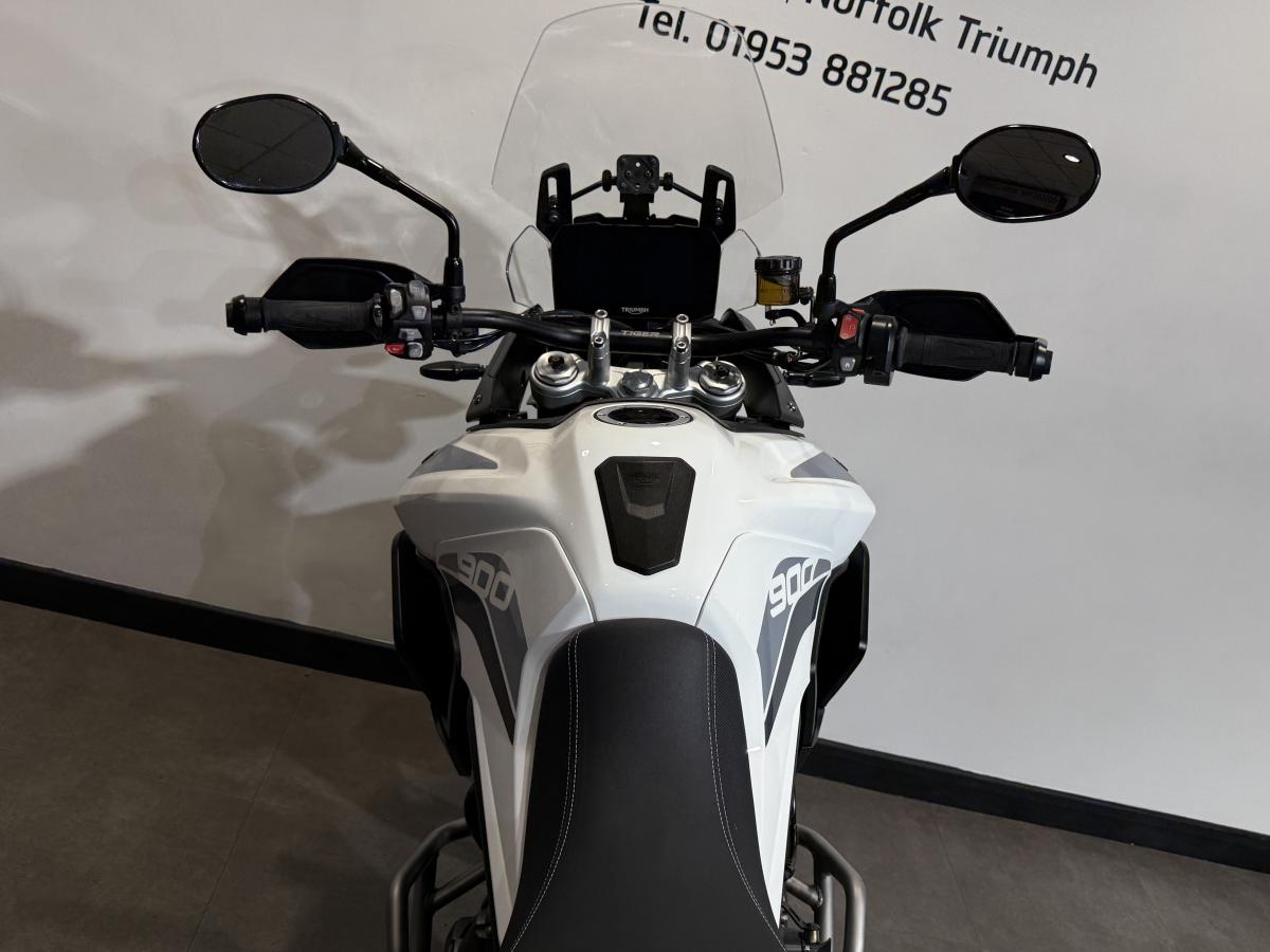 11703
