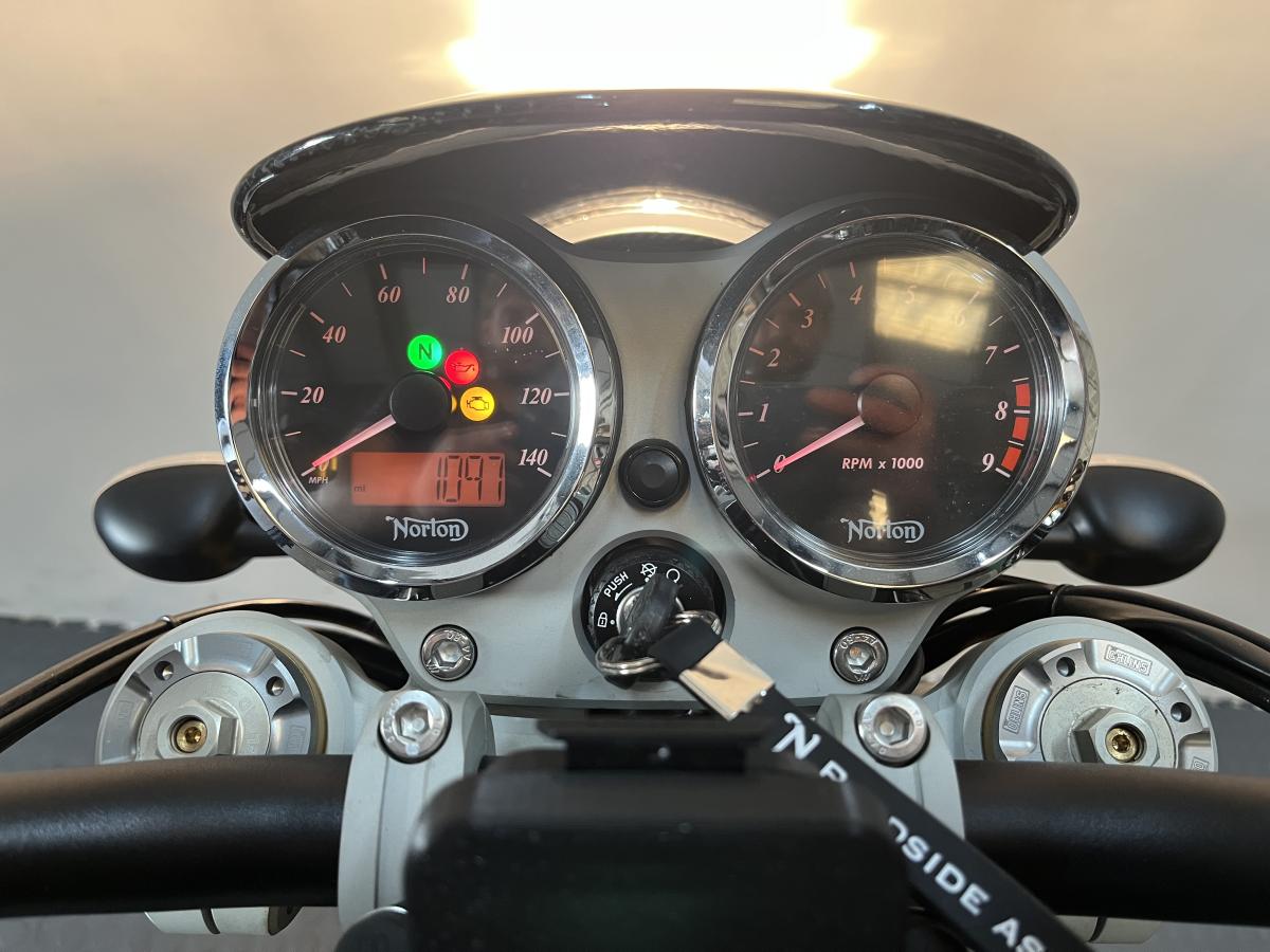11163