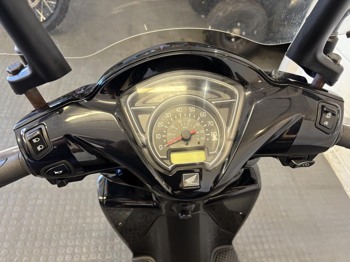 11165